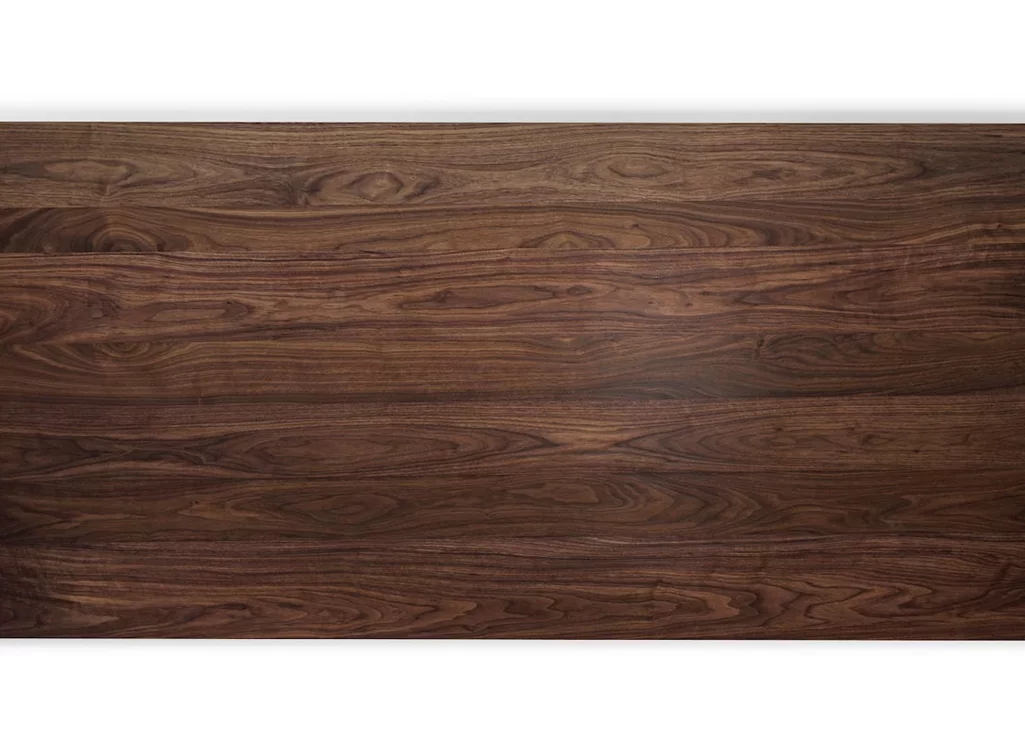 Aufgedoppelte Nussbaumtischplatte nach Mass