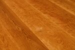 Tischplatte nach Maß aus Kirschbaumholz mit charaktervollem Astanteil
