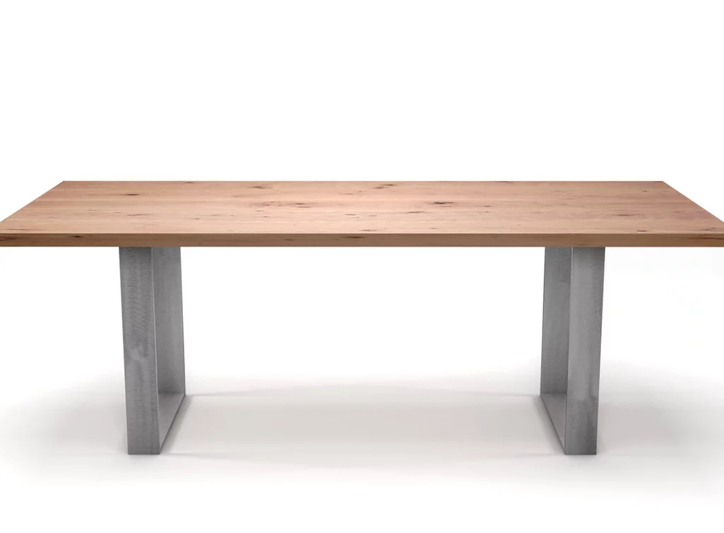 Esszimmertisch aus Buche mit Stahlkufen im reduzierten Design.