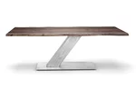 Moderner Baumtisch Nussbaum im Factory-Style mit stylischen Stahl Mittelfuß