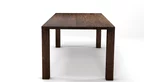 Massiver Nussbaum Tisch in Maßanfertigung mit einer 4cm starken Tischplatte.