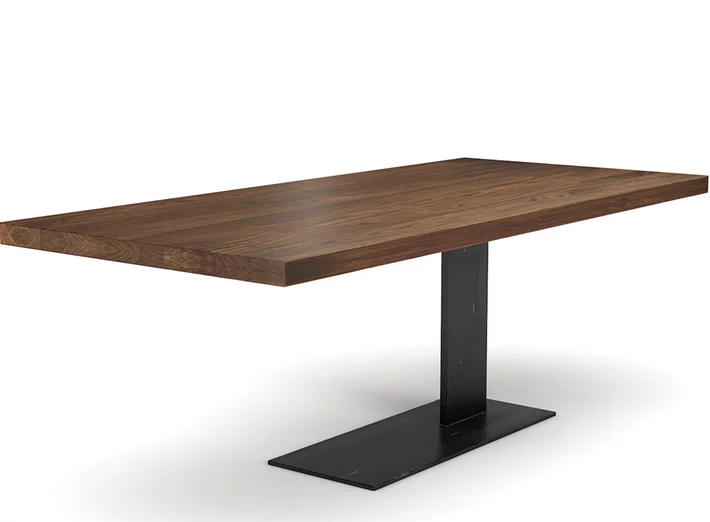 Nussbaumtisch im reduziertem Design mit einem Stahl Mittelfuß gefertigt