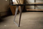 Tisch Eiche vollmassiv kombiniert mit filigranen Stahlkufen