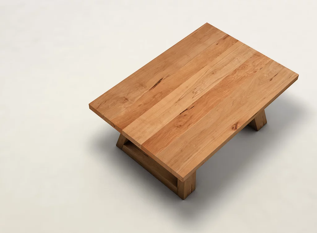 Wohnzimmertisch aus Kernbuche mit einer Massivholzplatte mit Astanteil gefertigt