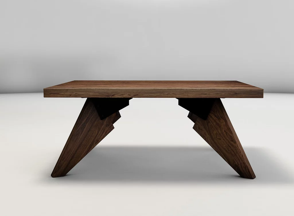 Massiver Couchtisch aus Nussbaum mit schräg gefertigten Tischfüßen