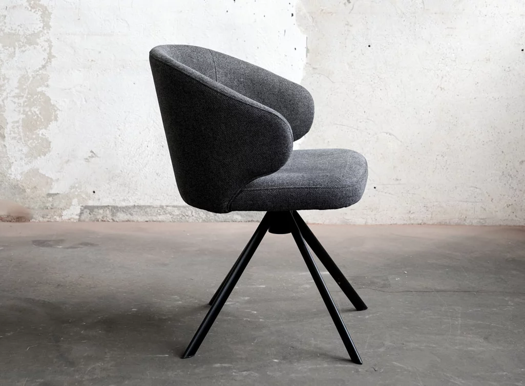 Esstisch Drehstuhl mit Stoff bezogen und einem Metall Gestell